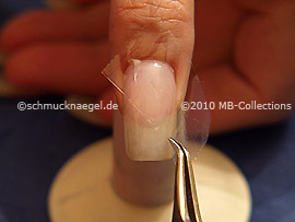 Clear adhesive tape and tweezers