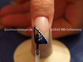 The clear nail lacquer protects the nail art