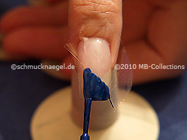 Nail lacquer in the colour dark blue