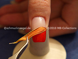 Dried leaf and tweezers
