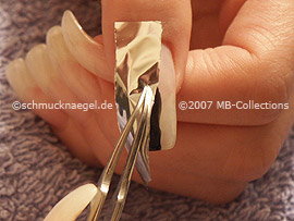 tweezers and the metallic foil in silver