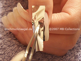 tweezers and the metallic foil in silver