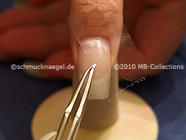 Clear adhesive tape and tweezers