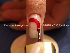 Nail lacquer in the colour dark red