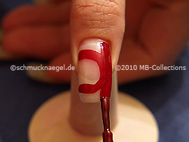 Nail lacquer in the colour dark red