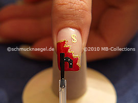 The clear nail lacquer protects the nail art