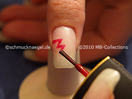 Nail lacquer in the colour red