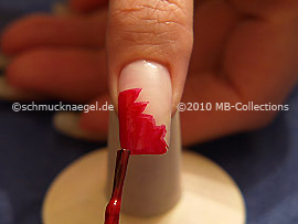 Nail lacquer in the colour red