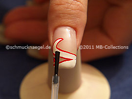 The clear nail lacquer protects the nail art