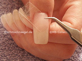 tweezers and the clear adhesive tape