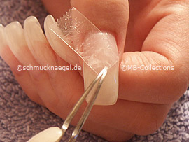 tweezers and the clear adhesive tape