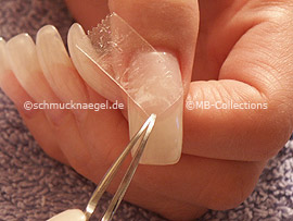 tweezers and the clear adhesive tape