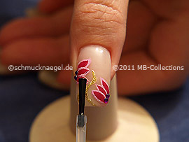 The clear nail lacquer protects the nail art