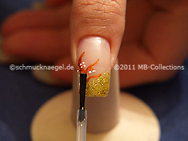 The clear nail lacquer protects the nail art