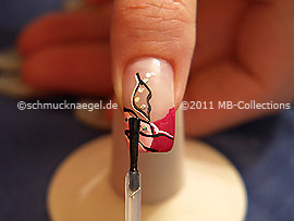 The clear nail lacquer protects the nail art