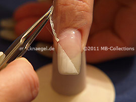 Tweezers and clear adhesive tape