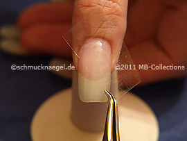 Clear adhesive tape and tweezers