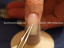 Clear adhesive tape and tweezers