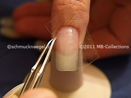 Clear adhesive tape and tweezers