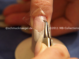Tweezers and clear adhesive tape