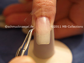 Clear adhesive tape and tweezers