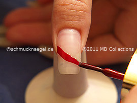 Nail lacquer in the colour dark red