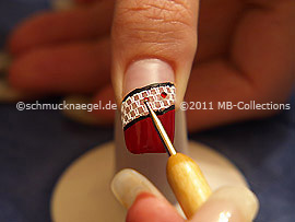 Strass stone in red and spot-swirl