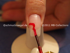 Nail lacquer in the colour red