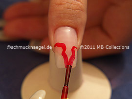 Nail lacquer in the colour red