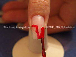 Nail lacquer in the colour red