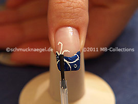 The clear nail lacquer protects the nail art