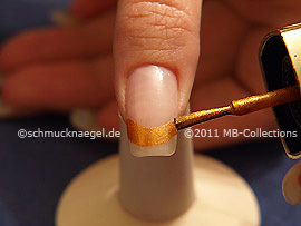 Nail lacquer in the colour brown with glitter particles