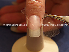 Clear adhesive tape and tweezers