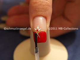 The clear nail lacquer protects the nail art