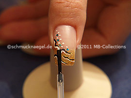 The clear nail lacquer protects the nail art