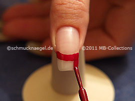 Nail lacquer in the colour dark red