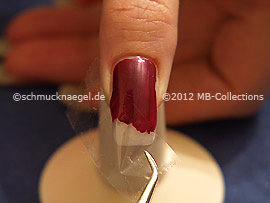 Tweezers and clear adhesive tape