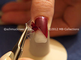Tweezers and clear adhesive tape