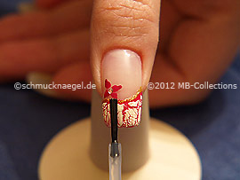 The clear nail polish protects the nail art