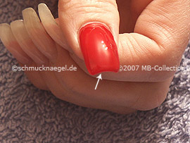 Nail polish in the colour red