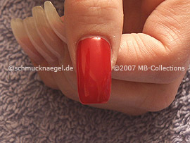 Nail polish in the colour red