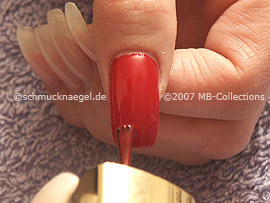 Nail polish in the colour red