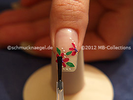 The clear nail lacquer protects the nail art