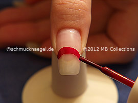 Nail lacquer in the colour dark red