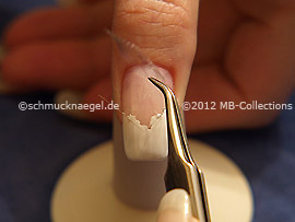 Tweezers and clear adhesive tape