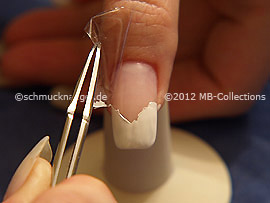 Tweezers and clear adhesive tape