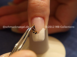 Nail art sticker with strass stones and the tweezers