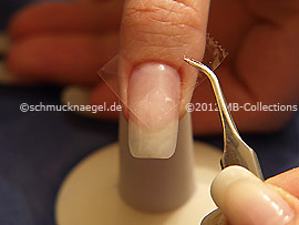 Clear adhesive tape and tweezers