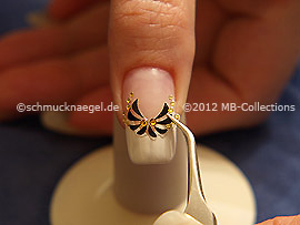 Nail art sticker with strass stones and the tweezers