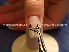 Nail art sticker with strass stones and the tweezers